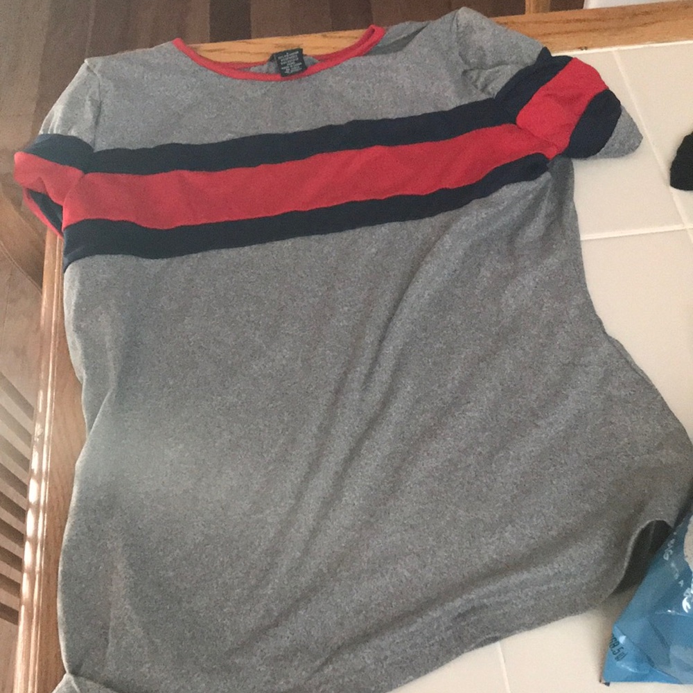 Gray shirt (there’s red and blue on it to)